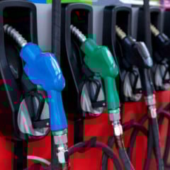 Fuel Pump, Gas Station, Gasoline. Colorful Petrol pump filling nozzles isolated on white background , Gas station in a service in warm sunset. Head fuel vehicle refueling facility in Asia